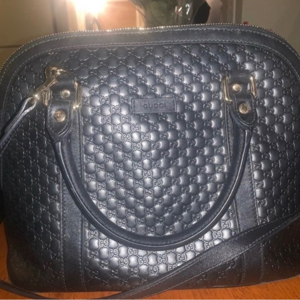 Black Gucci monogram purse